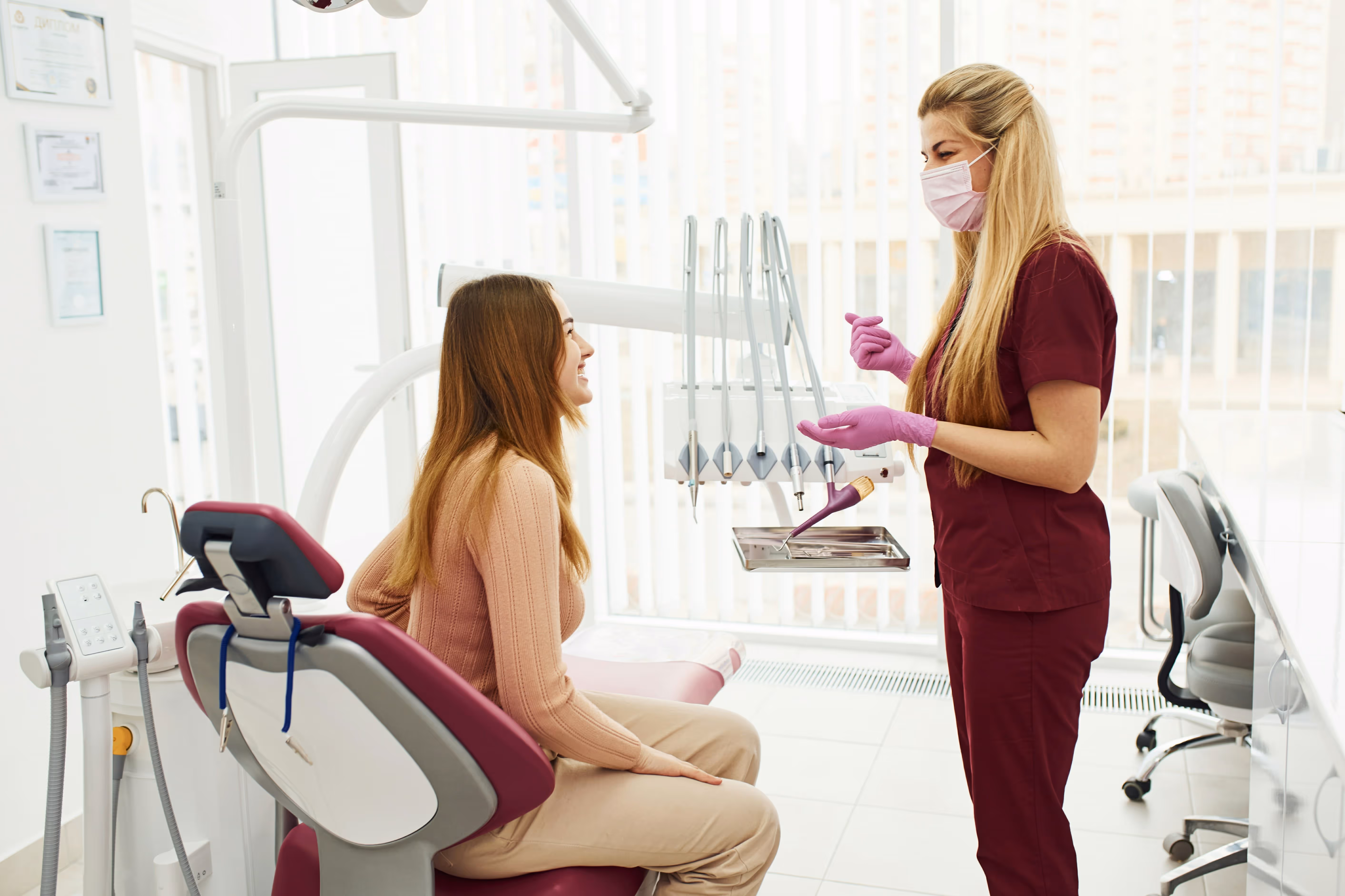 Dental Patient smiling after receiving a permanent crown
